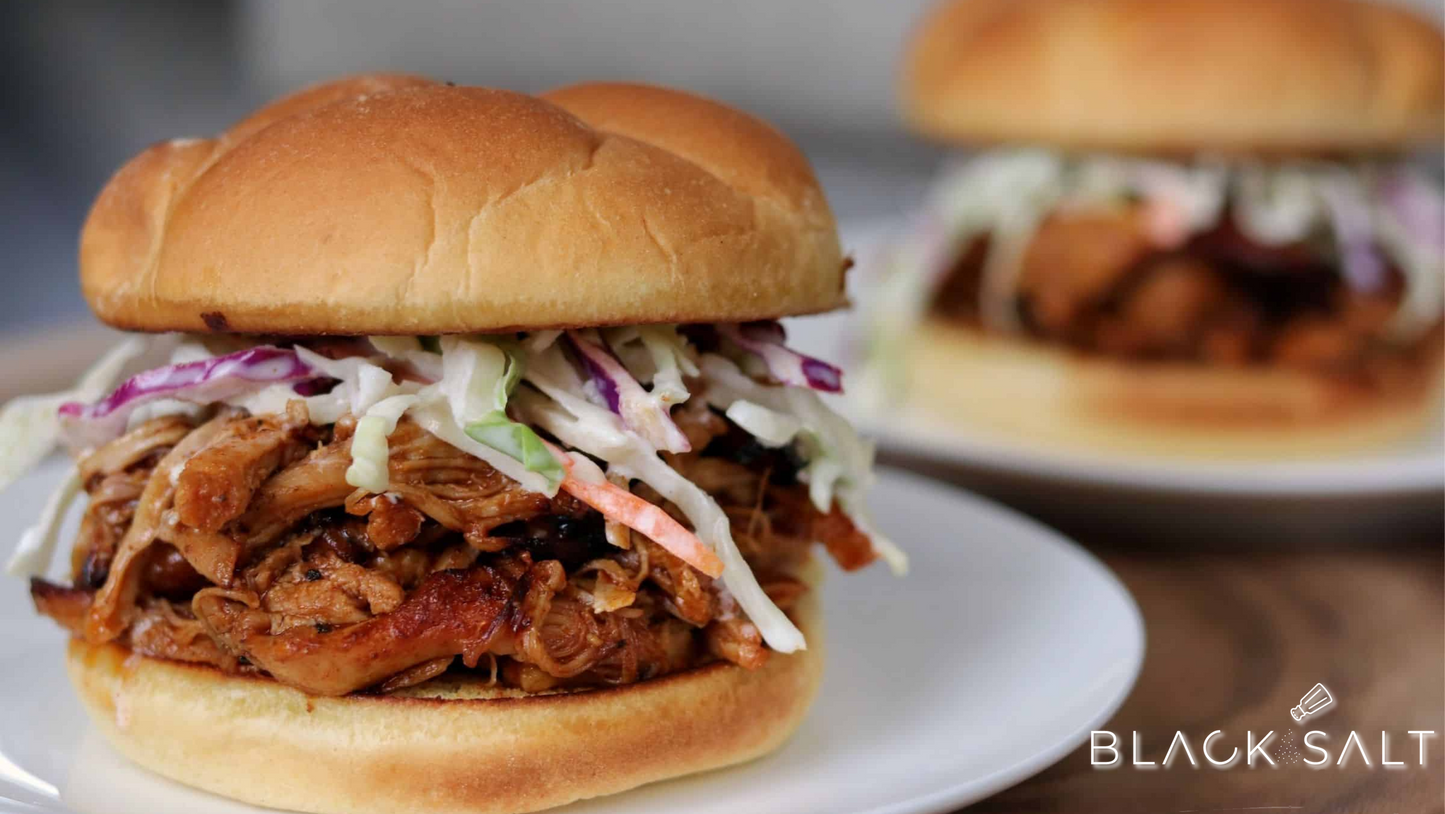 Tempting Blackened Chicken Sliders, featuring succulent and flavorful blackened chicken patties, served on mini buns, creating a delightful handheld option for your event or gathering.