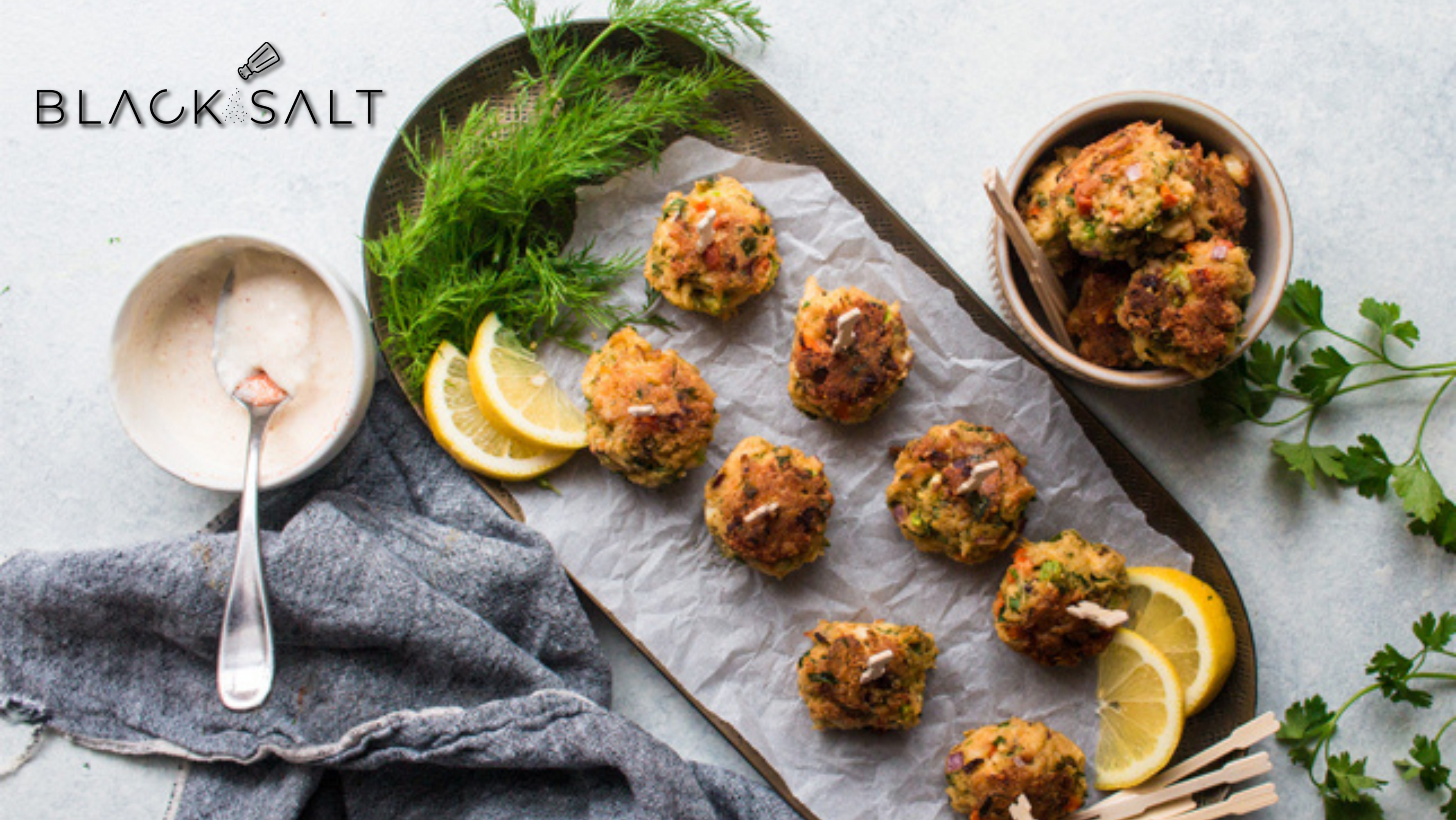 Mini Crab Cakes, bite-sized crab cakes made with lump crab meat, seasonings, and breadcrumbs, pan-fried or baked to a golden brown, offering a delicious and savory appetizer option.