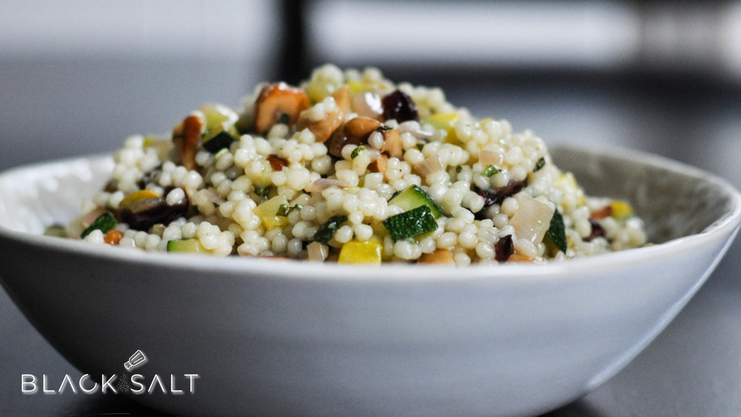 Squash Couscous Salad, a colorful and nutritious salad made with roasted or grilled squash, fluffy couscous, fresh herbs, and a tangy dressing, offering a delightful combination of flavors and textures.