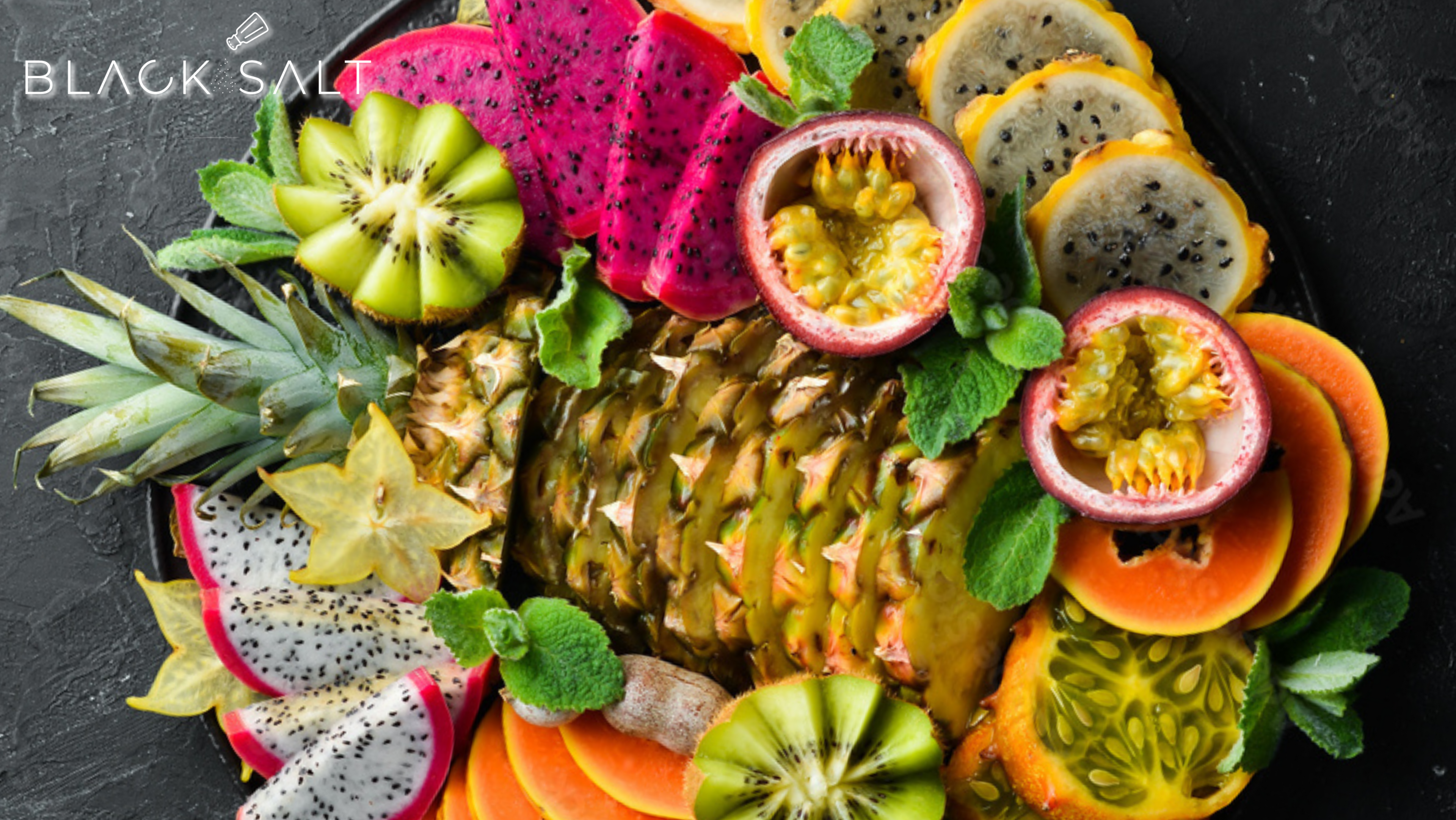 An artfully arranged platter showcasing a variety of fresh, seasonal fruits, offering a burst of colors, flavors, and natural sweetness.
