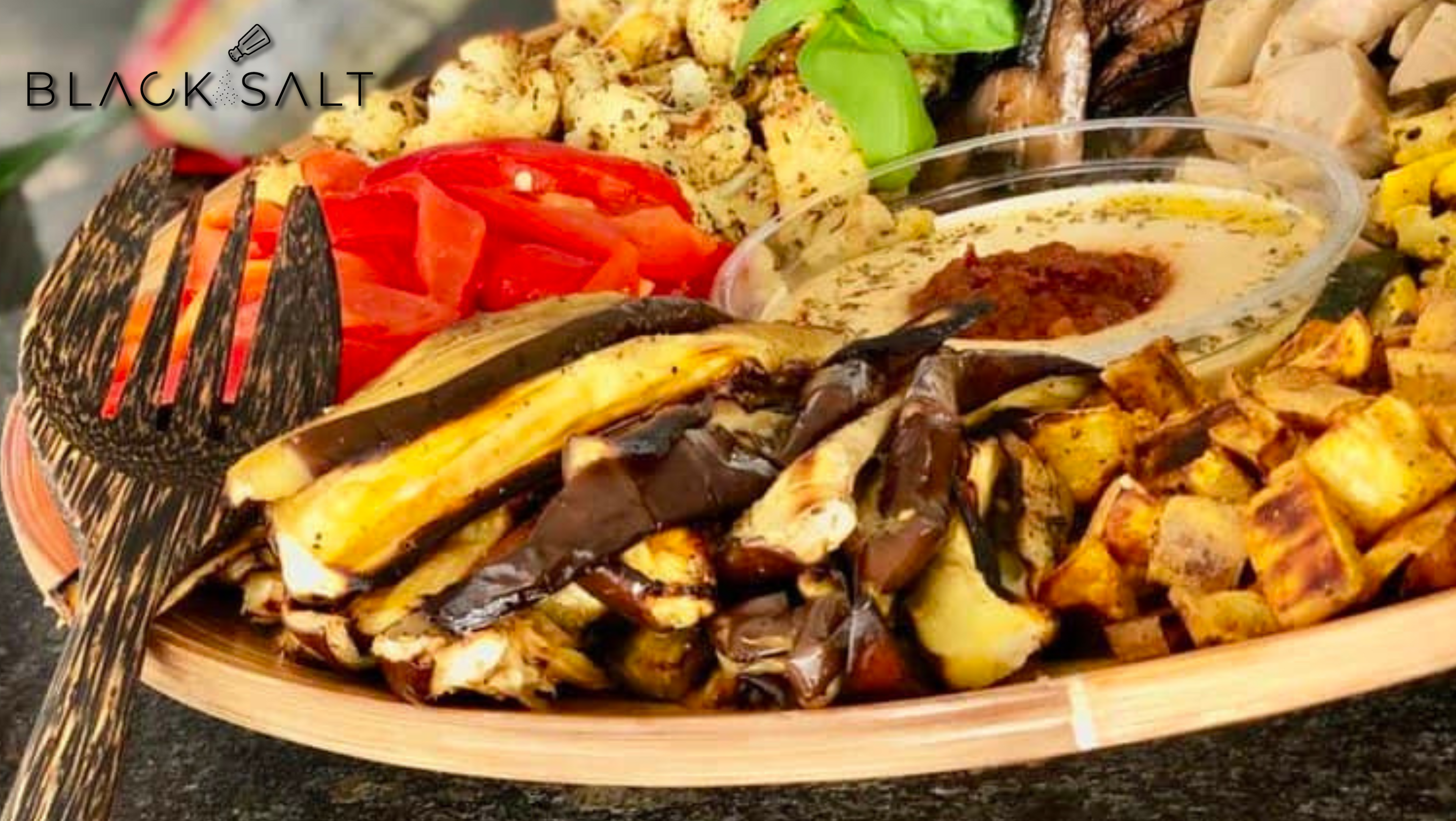A visually stunning assortment of fresh, vibrant vegetables meticulously arranged on a platter, creating a feast for the eyes and a healthy option for your guests.
