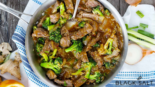 Savory Beef and Broccoli, featuring tender beef slices and crisp broccoli florets, stir-fried in a flavorful sauce, creating a delicious and satisfying combination.