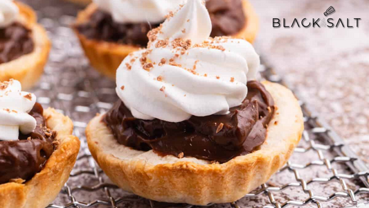 Chocolate Mousse Cups, delectable individual servings of smooth and creamy chocolate mousse, elegantly presented in edible cups, creating a decadent and irresistible dessert.