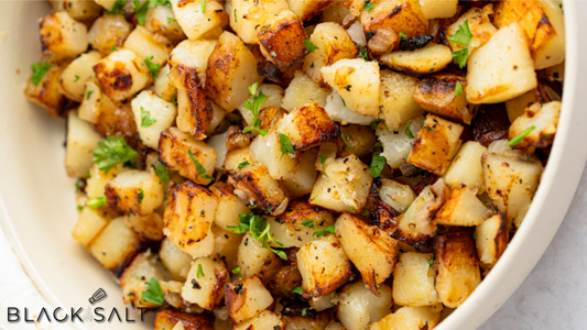 Country Potatoes Tray, a generous serving of seasoned and golden-brown country-style potatoes, offering a delicious and satisfying side dish option for your event or gathering.
