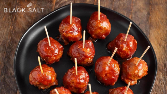 Cranberry Chili Meatballs, succulent meatballs glazed with a tangy and slightly sweet cranberry chili sauce, offering a delightful combination of flavors for a savory appetizer or party snack.