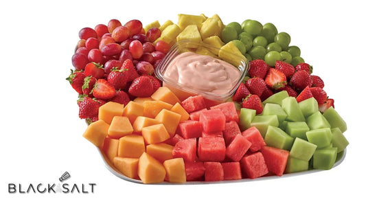 Fresh Fruit Tray, a delightful arrangement of assorted fresh fruits, including berries, melons, grapes, and tropical fruits, offering a vibrant and healthy option for snacking or as a refreshing addition to any event or gathering.
