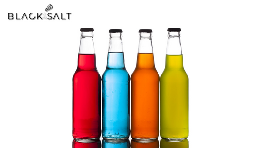 Glass Bottled Sodas, a collection of assorted sodas in classic glass bottles, offering a nostalgic and refreshing beverage option for enjoying a fizzy and flavorful drink.