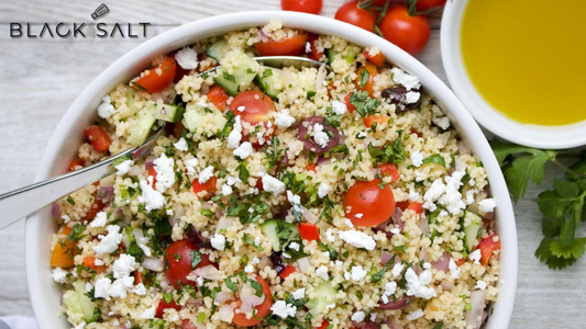 Mediterranean Couscous Salad, a vibrant and flavorful salad made with fluffy couscous, fresh vegetables, herbs, olives, feta cheese, and a tangy dressing, offering a refreshing and nutritious dish inspired by Mediterranean flavors.