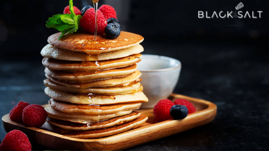 Pancake Tray, a delightful assortment of fluffy and golden pancakes, served with a variety of toppings such as syrup, butter, fruits, and whipped cream, offering a delicious and classic breakfast or brunch option.
