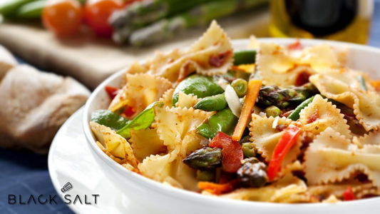 Pasta Primavera, a vibrant and flavorful pasta dish featuring a medley of fresh seasonal vegetables, tossed with pasta and a light sauce, creating a colorful and satisfying meal option.