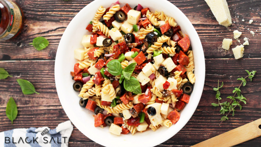 Pasta Salad, a refreshing and versatile salad made with cooked pasta, crisp vegetables, and a flavorful dressing, offering a colorful and delicious side dish or light meal option for picnics, barbecues, or gatherings.
