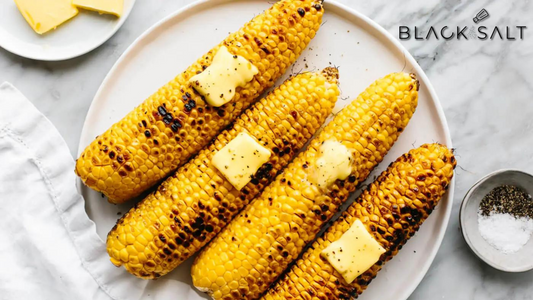 Roasted Corn on the Cob, ears of corn grilled or roasted to perfection, offering a smoky and sweet flavor with a hint of char, creating a classic and delicious side dish option.