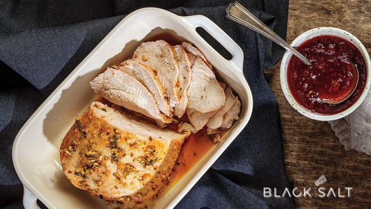 Roasted Turkey, a succulent and flavorful whole turkey, cooked to perfection with crispy skin and tender meat, often enjoyed as a centerpiece for holiday feasts or special occasions.