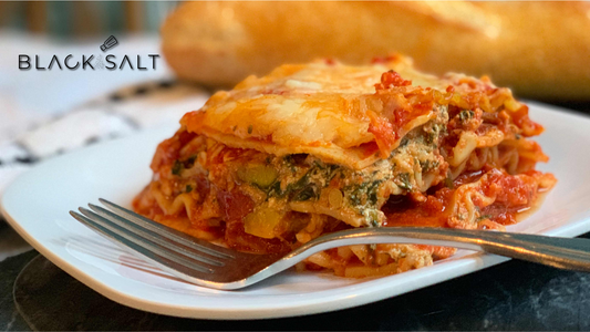 Roasted Vegetable Lasagna, a delicious and hearty lasagna made with layers of roasted vegetables, lasagna noodles, tomato sauce, and cheese, offering a flavorful and satisfying vegetarian option for pasta lovers.