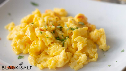 Scrambled Eggs Tray, a generous serving of fluffy scrambled eggs, seasoned to perfection, offering a classic and satisfying option for breakfast or brunch gatherings.