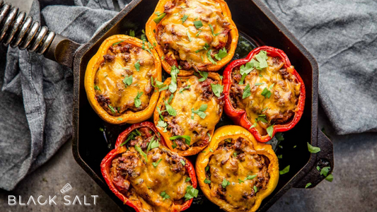 Mini Stuffed Peppers, bite-sized bell peppers filled with a savory mixture of meats, cheeses, and/or vegetables, baked to perfection, offering a delightful and flavorful appetizer or snack option.