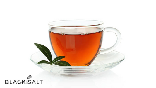 A cup of hot tea, soothing and comforting, with steam rising from the cup, providing a cozy and relaxing beverage option for a moment of calm and enjoyment.