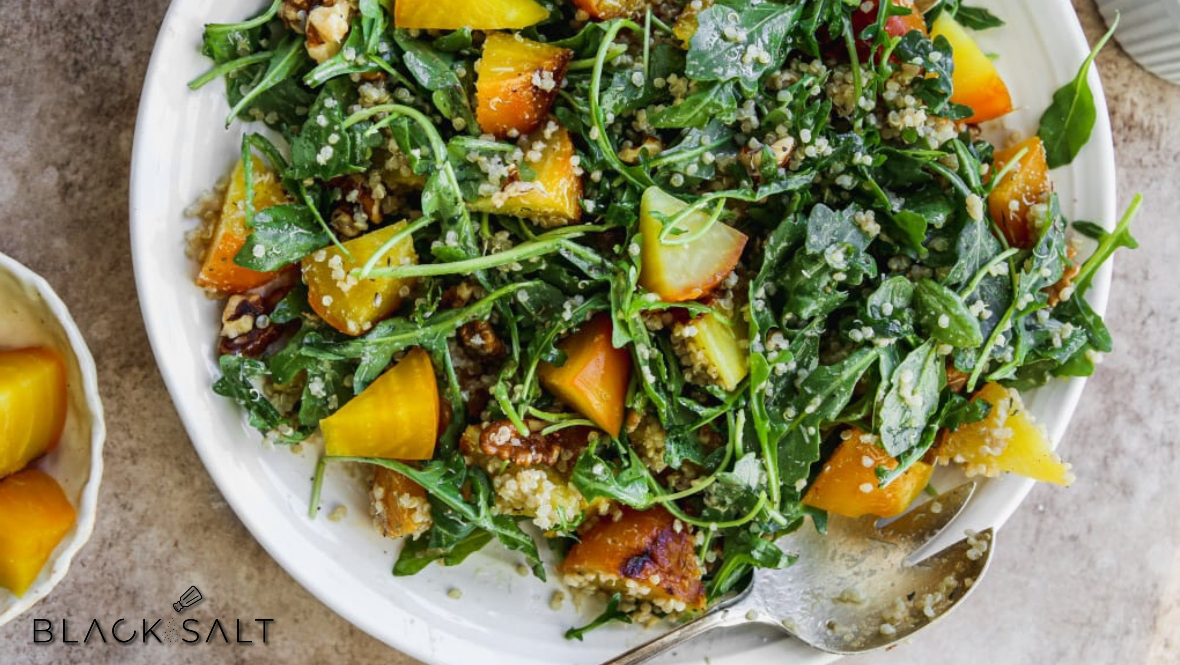 Vegan Quinoa Salad, a nutritious and colorful salad made with cooked quinoa, mixed with a variety of fresh vegetables, herbs, and a zesty dressing, offering a healthy and satisfying plant-based option for a light meal or side dish.