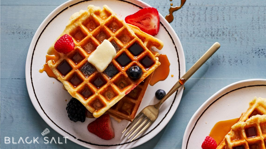 Waffles Tray, a tempting display of freshly made waffles served on a platter, topped with butter, syrup, fruits, or other delicious toppings, offering a delightful and classic breakfast or brunch option.